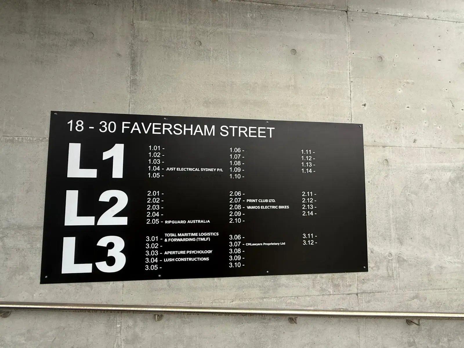 Tenant board at 18–30 Faversham Street listing CMLawyers Proprietary Ltd at Unit 3.07, Level 3